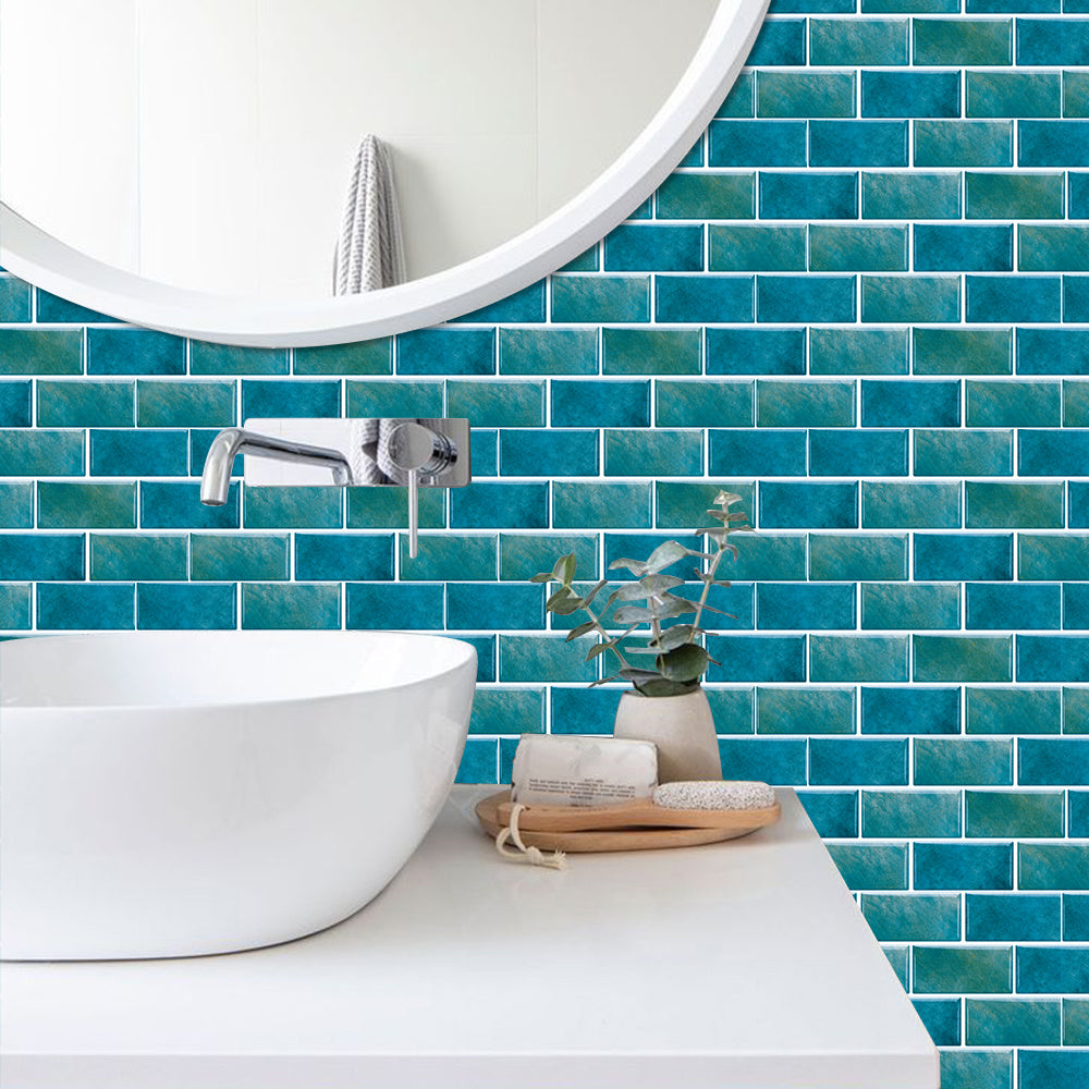 Blue green marble tile wall stickers in bathroom with white sink and round mirror