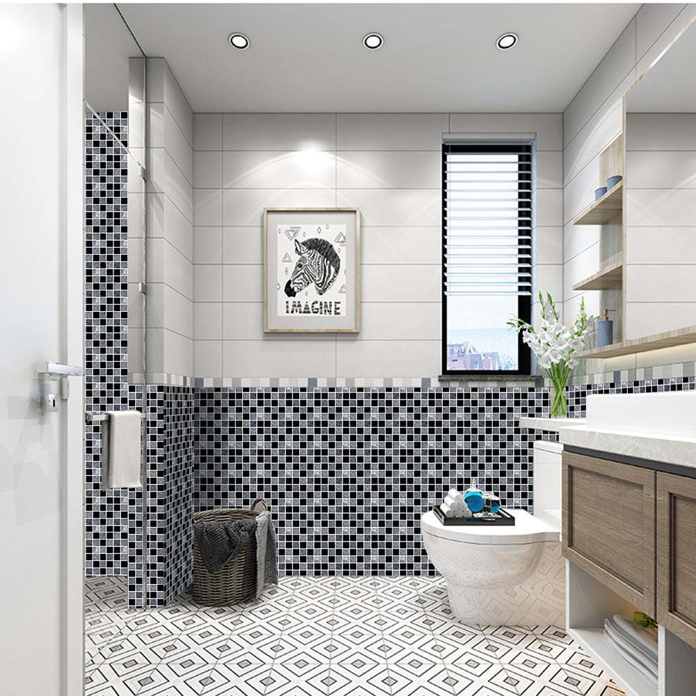 Modern bathroom with black and white mosaic kitchen bathroom tiles on walls and geometric floor tiles