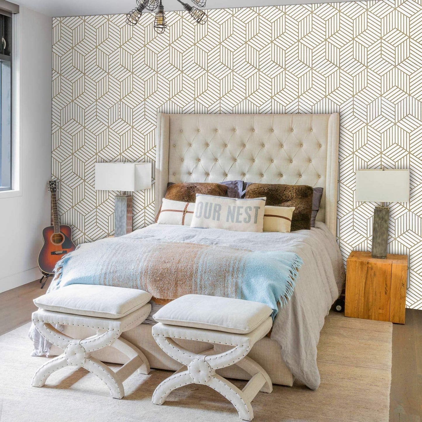 Modern bedroom with hexagon self-adhesive removable contact paper wallpaper on the wall behind bed