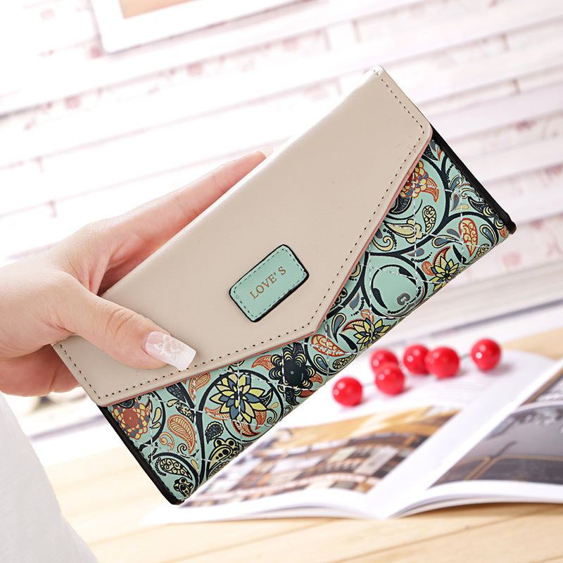 BIRDS wallet for women with floral embroidery and zipper buckle in beige and patterned PU leather