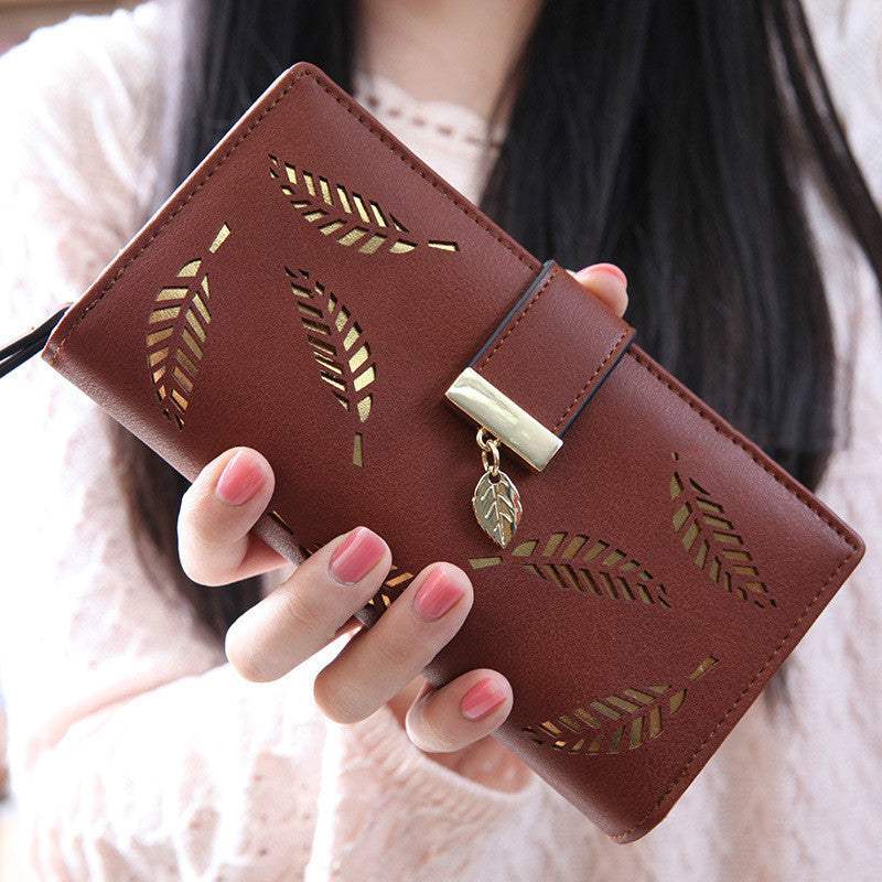 Brown women long wallet with hollow leaf design and gold clasp charm