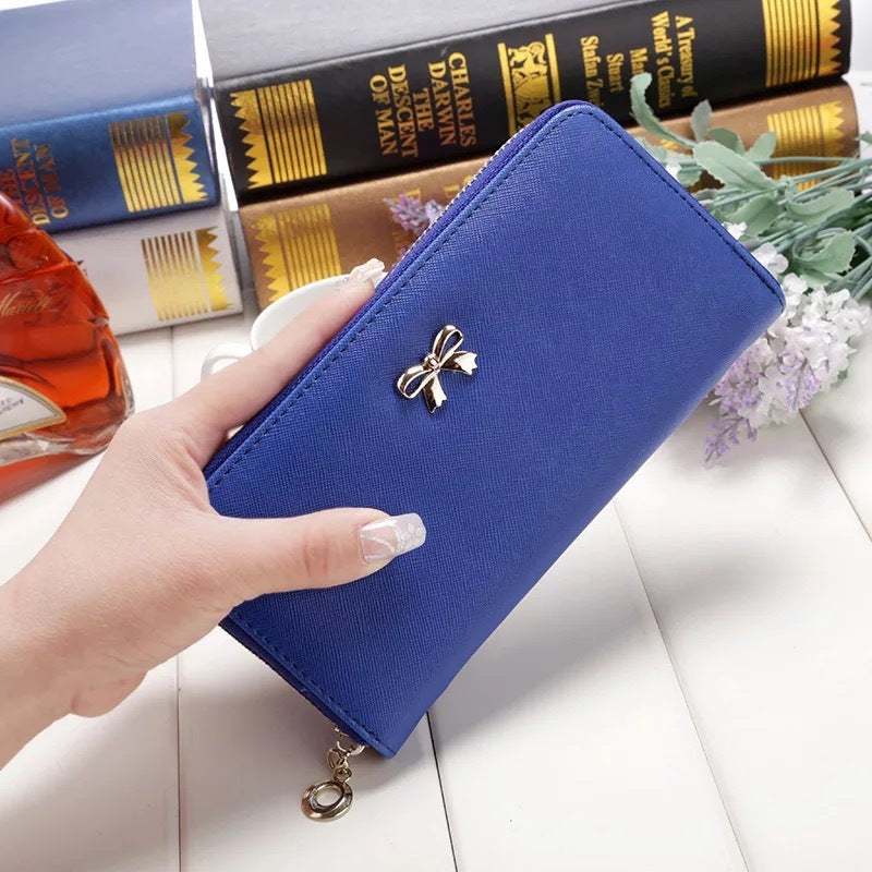 Blue PU ladies wallet handbag with zipper and bow detail, 19x9.5x3cm