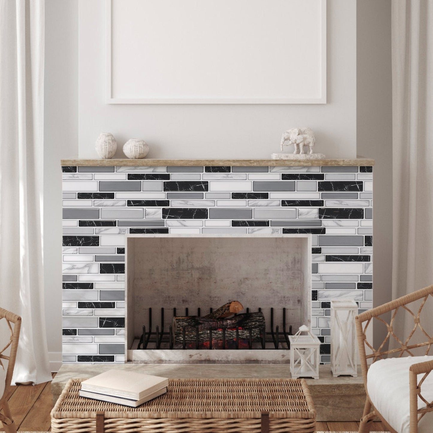 modern fireplace with black and white peel and stick backsplash tiles in living room