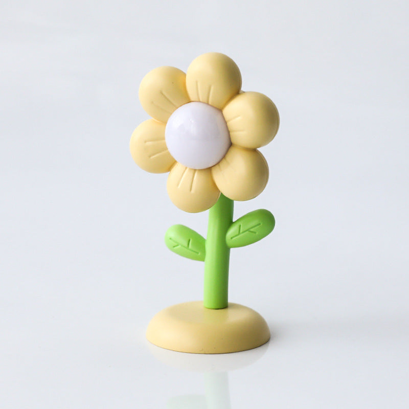 Mini magnetic small night lamp shaped like a yellow flower with green stem and base for home decor