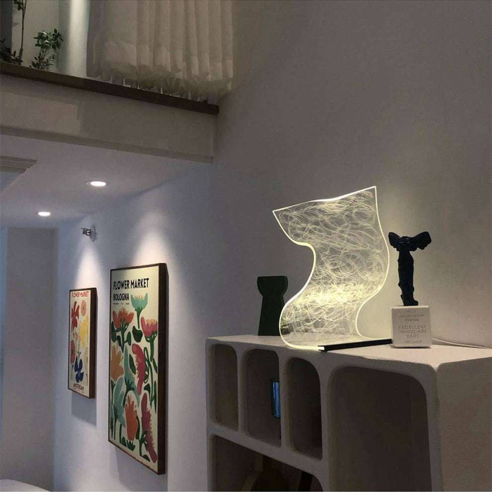 Warm high appearance level bedside lamp with soft glow in modern home decor setting