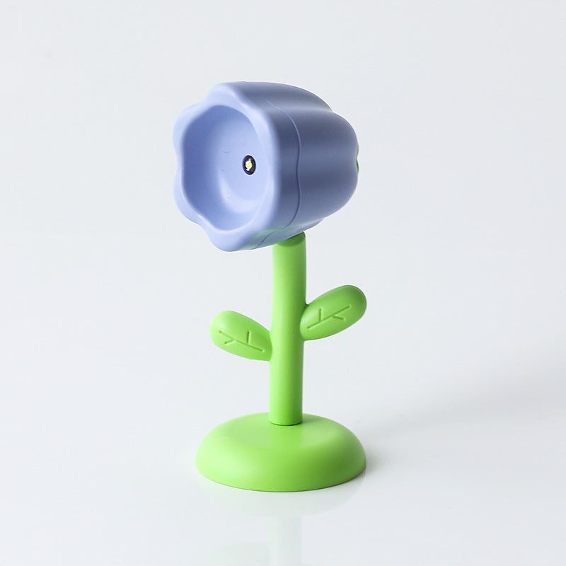 Mini magnetic small night lamp shaped like a purple flower with green stem and base, warm light home decor