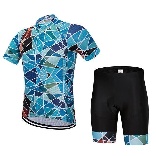 Cycling set with blue geometric tile pattern jersey and black padded shorts with matching tile accents