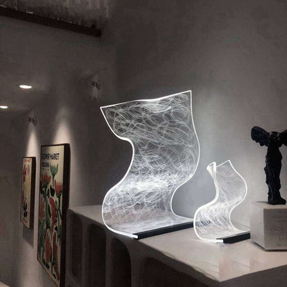 Warm high appearance level bedside lamp with artistic translucent wavy design and ambient white light for home decor