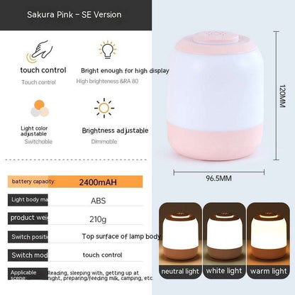 Rechargeable touch LED night lamp with adjustable brightness and color, pink ABS material, portable for reading, sleeping, and camping.