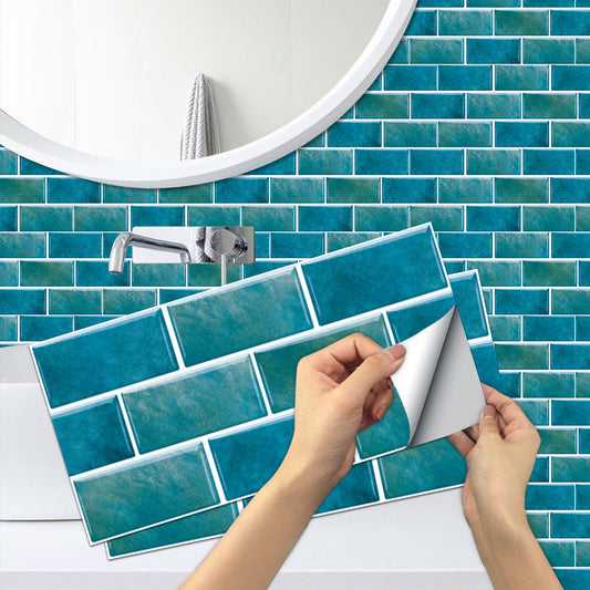 Blue green marble tile wall stickers being applied on bathroom wall with round mirror and faucet