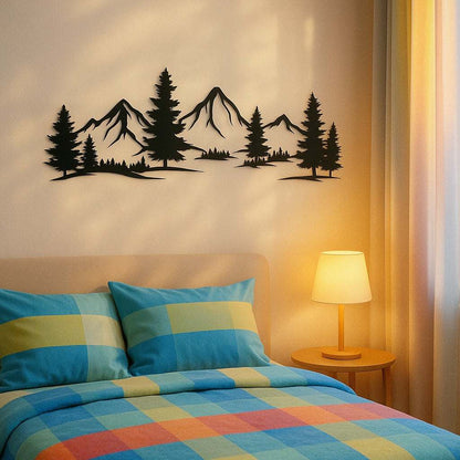 Rustic metallic wall art with evergreen forest and mountain design above bed in cozy child's room