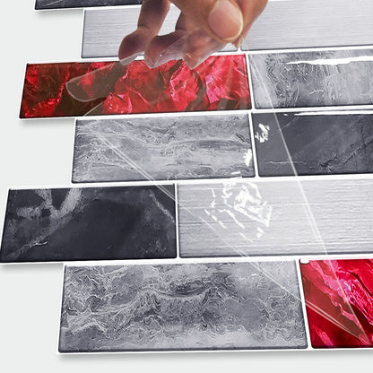Red marble look peel and stick waterproof wallpaper tiles being applied with a hand