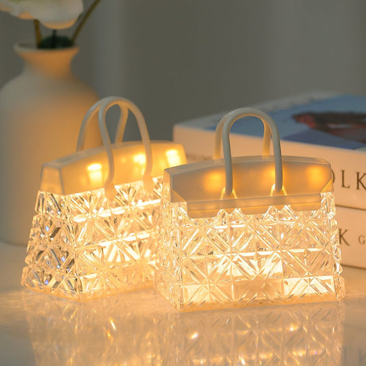 Acrylic warm light small night lamp shaped like a geometric transparent handbag with built-in battery