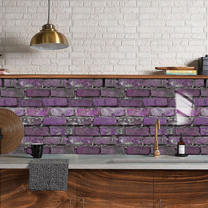 Purple peel and stick brick wall tile backsplash in modern kitchen with wooden cabinets and brass pendant light