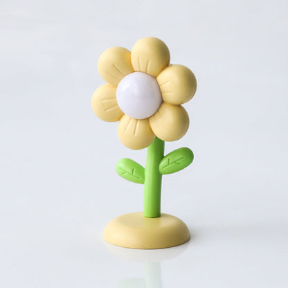 Mini magnetic small night lamp shaped like a yellow flower with green stem and base for home decor