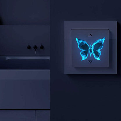 Blue luminous small butterfly glowing decorative wall sticker in dark room