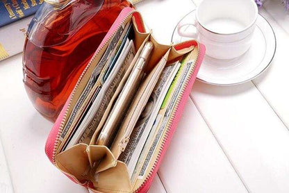 Ladies wallet handbag in pink PU leather with zipper and multiple compartments