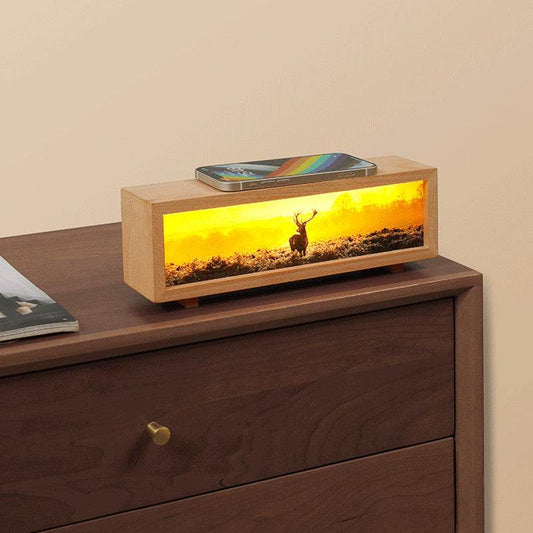 Creative lighting painting small night lamp with elk design and wireless phone charging on wooden dresser