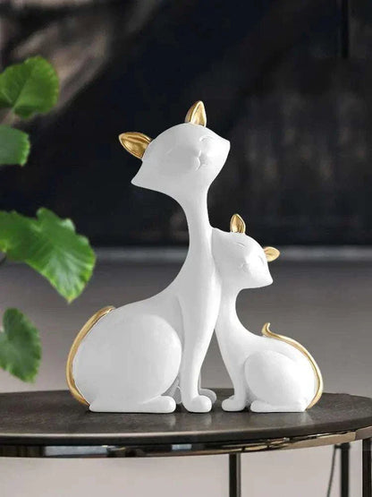 White modern minimalist lucky cat figurines with gold accents for home decor