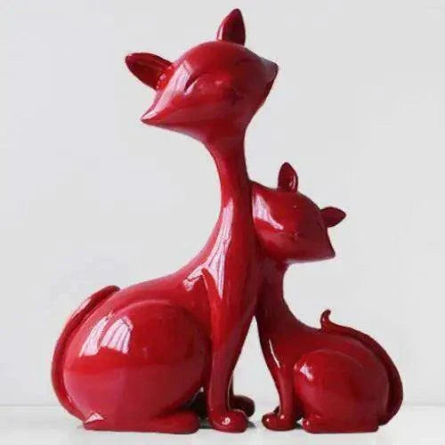 Glossy red modern minimalist lucky cat figurine with simple sleek design for home decor