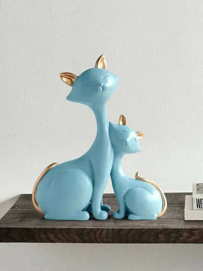 Modern minimalist blue lucky cat figurines with gold accents for home decor