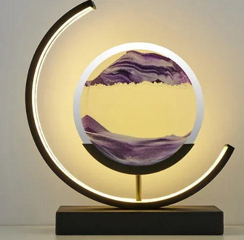 Chinese style hourglass table lamp with purple sand and circular LED frame on black base