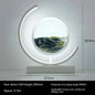 Contemporary decorative lamp with circular LED design and scenic hourglass centerpiece, Chinese style hourglass table lamp alternative.