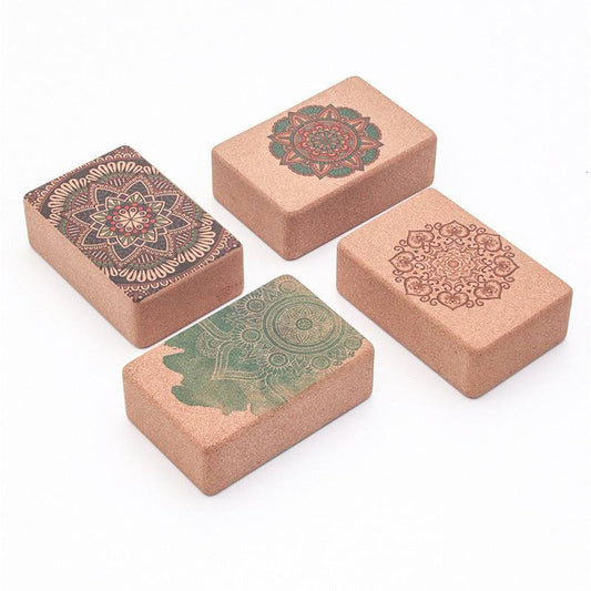 Set of four yoga cork tiles with intricate mandala designs for fitness and bodybuilding practice