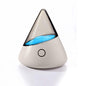Colorful small night lamp with geometric stereo design and built-in battery on white background