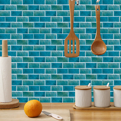 Blue green marble tile wall stickers applied on kitchen backsplash with wooden utensils and countertop items