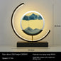 Chinese Style Hourglass Table Lamp with illuminated curved iron frame and blue sand timer centerpiece on black base