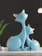 Modern minimalist blue lucky cat figurines with gold accents for home decor