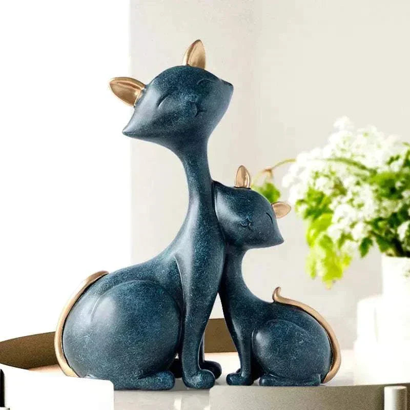 Modern minimalist Nordic lucky cat figurine in dark blue resin with gold accents for home decor